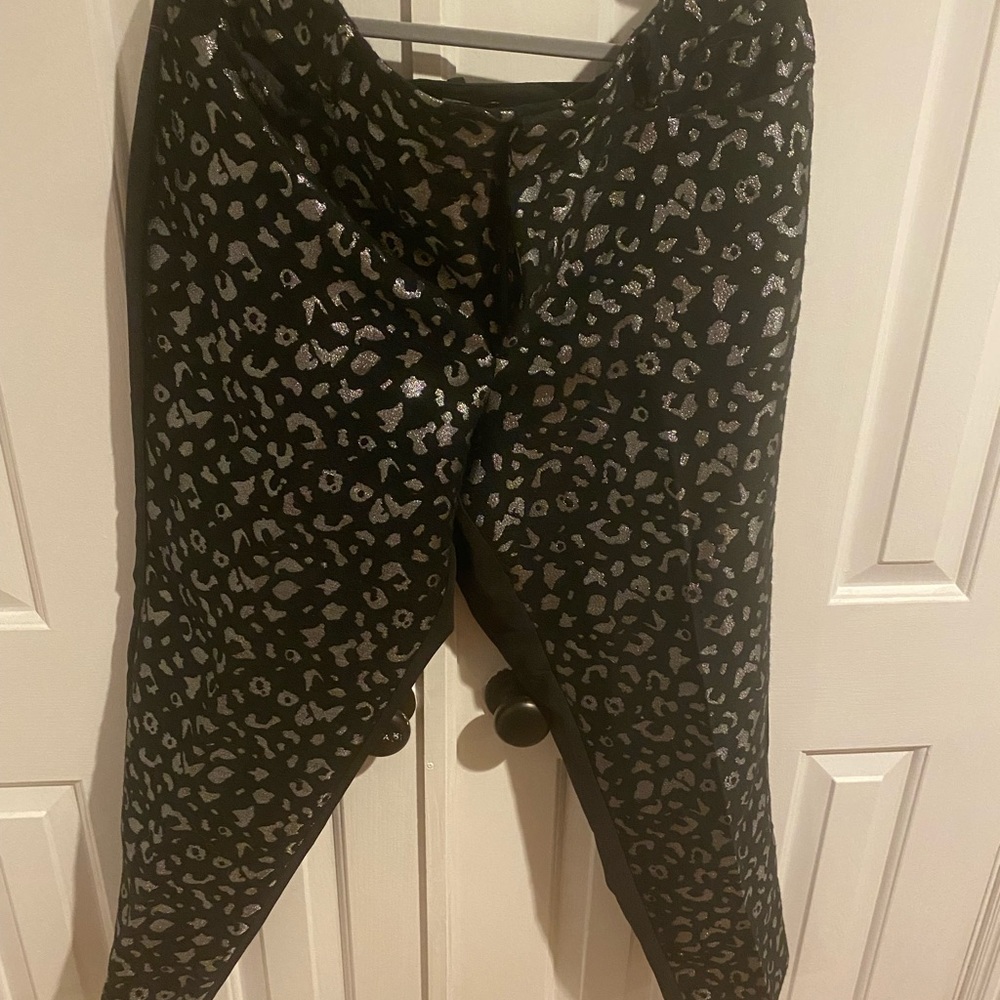 Eloquii black ankle length pants with silver leopard print stitching